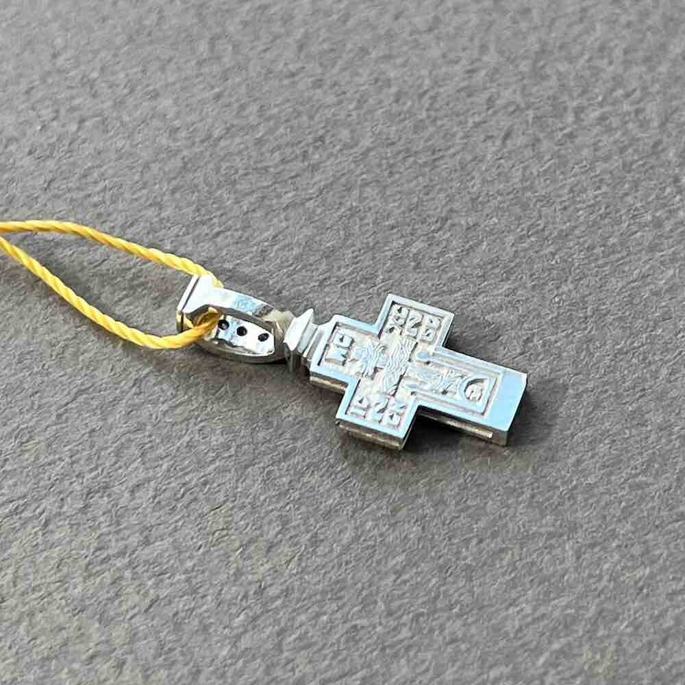 Купить Крест из белого золота "Спас Нерукотворный" с сапфирами (41049)