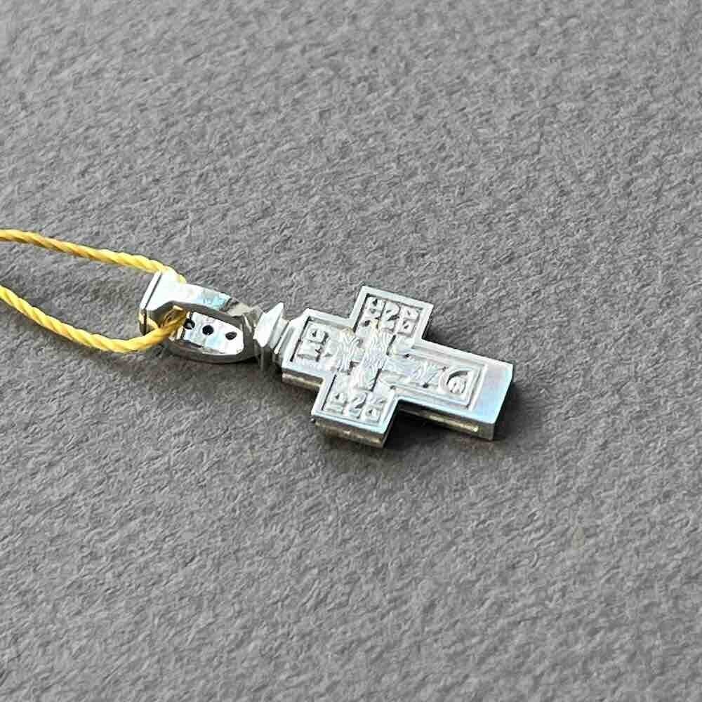 Купить Крест из белого золота "Спас Нерукотворный" с сапфирами (41049)