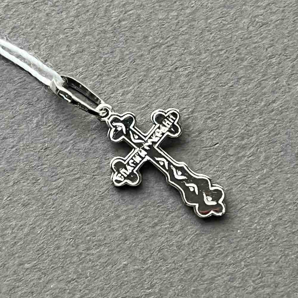 Купить Крест из белого золота "Спаси и Сохрани" с изумрудами (41527)