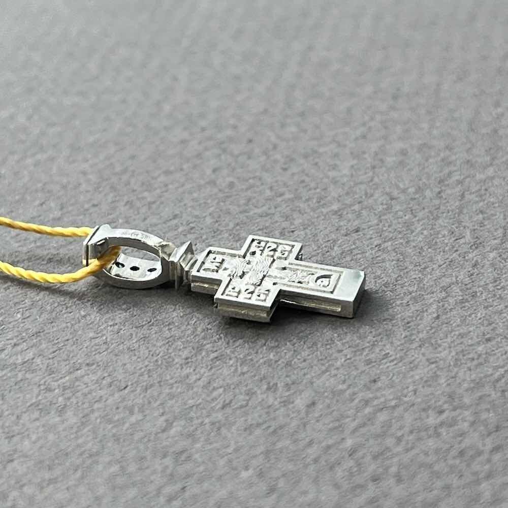 Купить Крест из белого золота "Спас Нерукотворный" с сапфирами (41049)