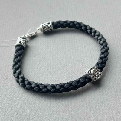 картинка Браслет из шнурка и серебра "Спас Нерукотворный" (12292) 