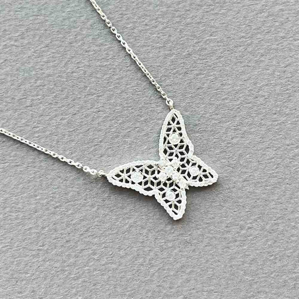 Купить Подвеска из белого золота "Бабочка" с бриллиантами на цепочке (51108)