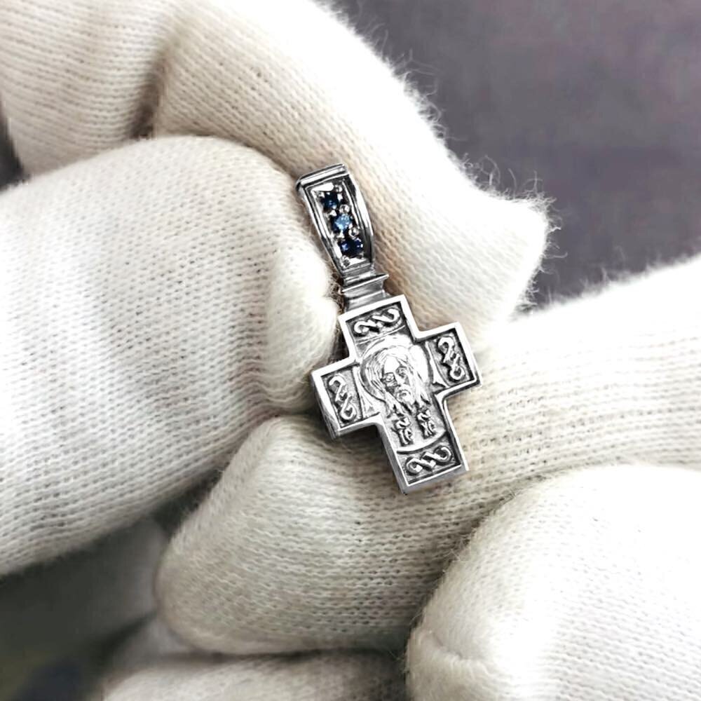 Купить Крест из белого золота "Спас Нерукотворный" с сапфирами (41049)